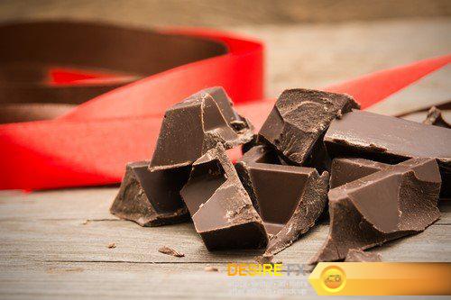 Pieces of chocolate bar with red ribbon 7X JPEG